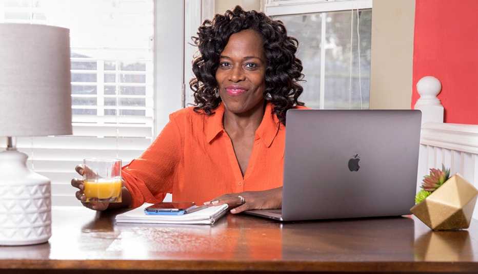 Leslie Bailey-Clarke working from a desk at home.