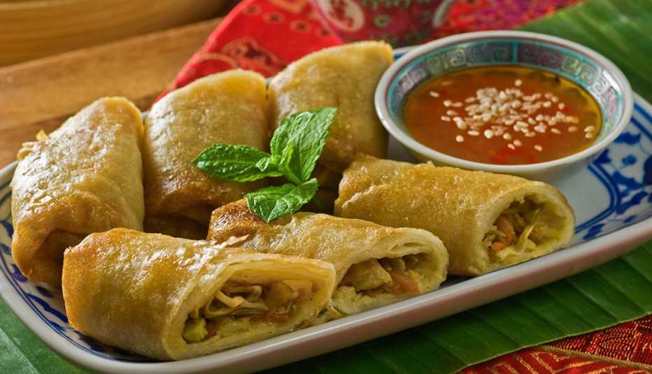 Spring rolls with chilli sauce. 