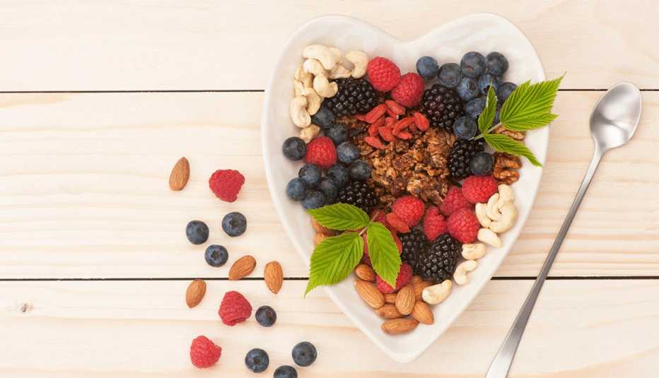 Heart Shaped Bowel Filled With Granola, Nuts And Fresh Fruit, AARP Healthy Living, Fruit Salad Recipes