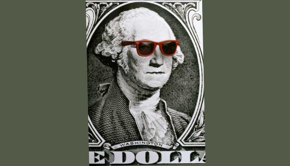 Imagen de un billete de dólar de George Washington con gafas y aprende a manejar tu dinero en el verano.