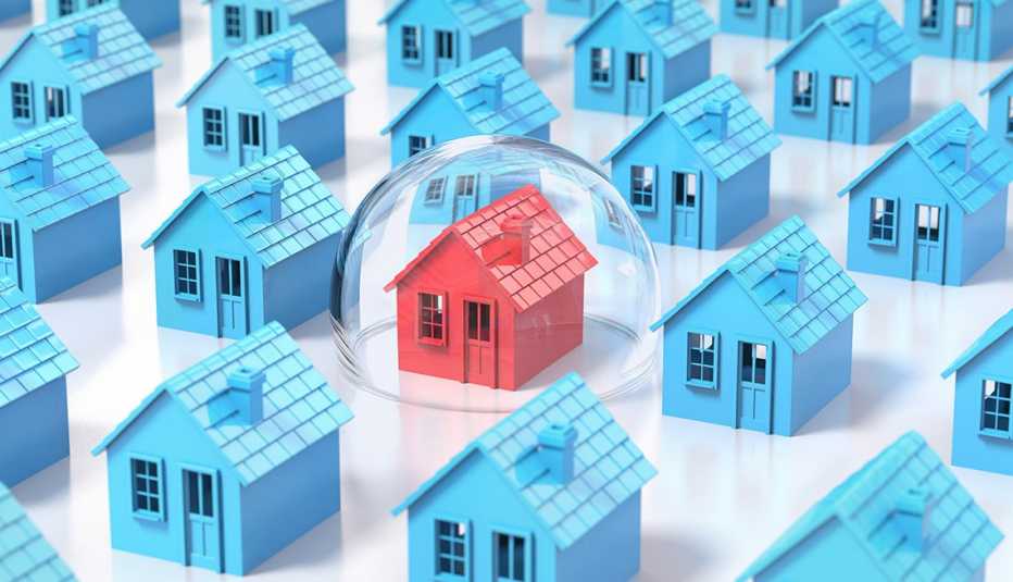 Ilustración de casas azules y una roja dentro de una burbuja.
