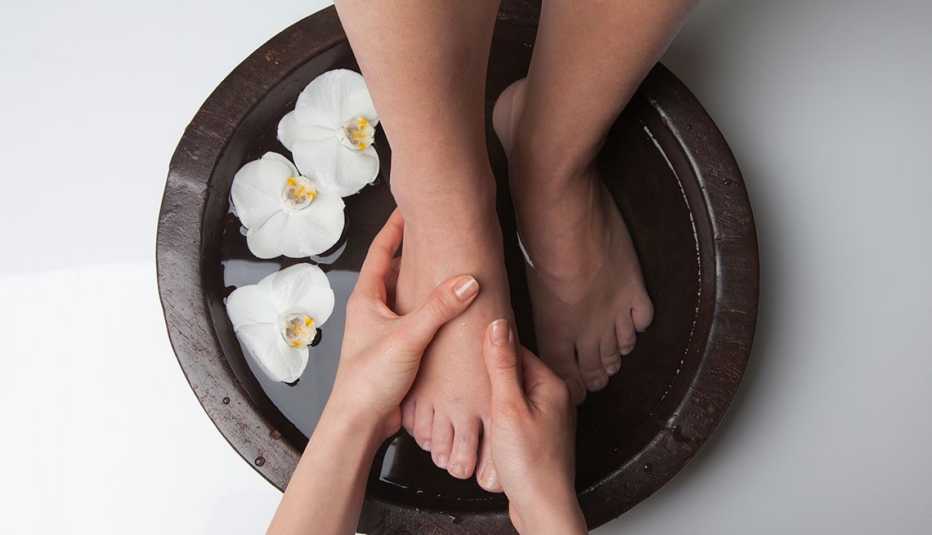 woman at spa getting foot massage 