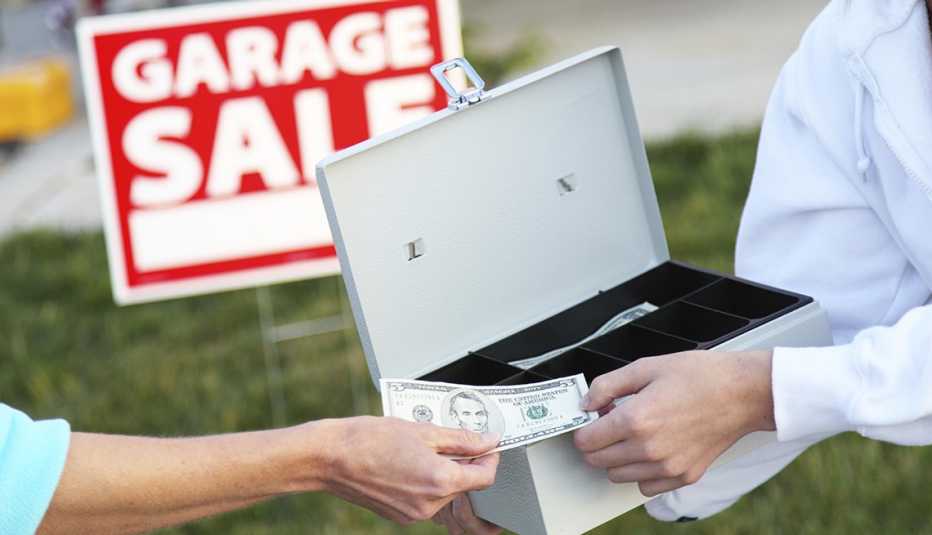 People Exchange Money At Garage Sale, Yard, Outdoors, AARP Home And Family, Queen Of Clutter