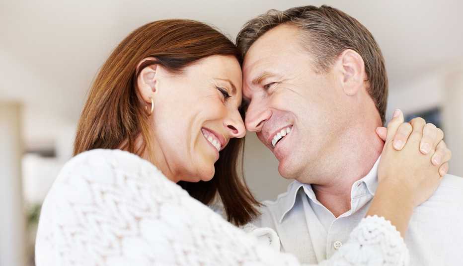 Mature Couple Smile And Touch Foreheads As They Hug, AARP Home And Family, Sex And Intimacy, Popular Erection Drugs Other Than Viagra
