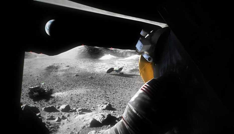 Un astronauta mira la superficie de la luna