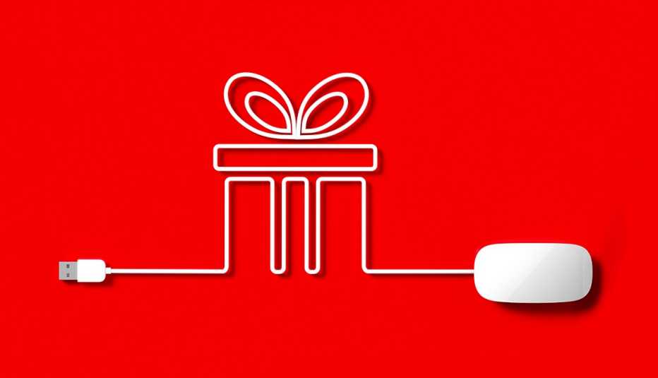 Cable de mouse de computadora forma una caja de regalo sobre un fondo rojo