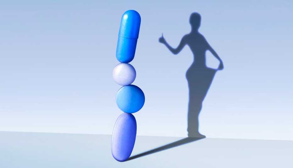 Ilustración de varias pastillas de diferentes formas que forman una torre y su sombra es una persona que ha perdido peso
