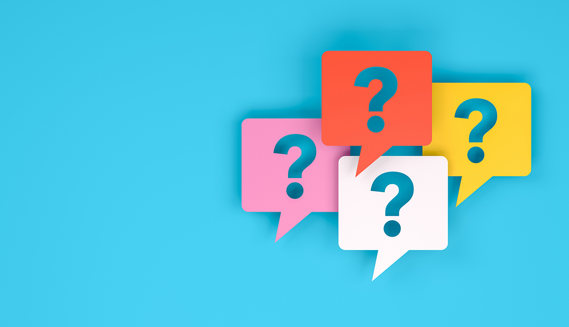 four question marks in speech bubbles on a blue background