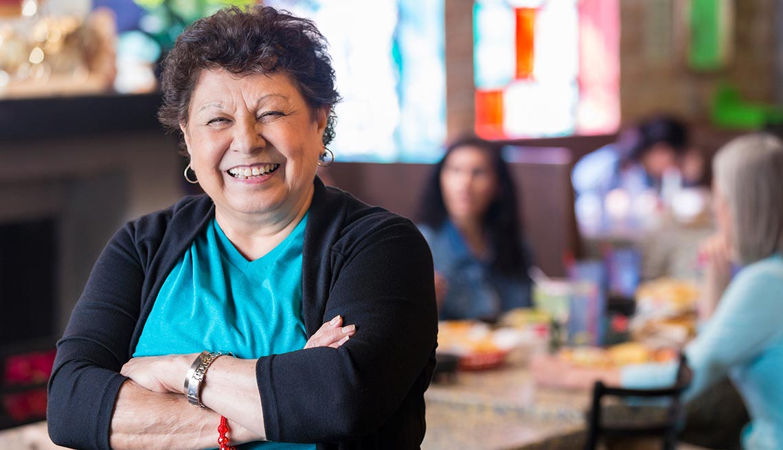 Woman smiling, family-owned restaurant, Work for Yourself 50+, AARP Foundation 
