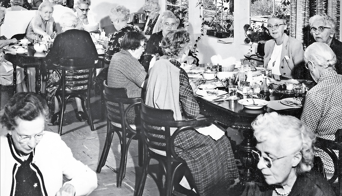 item 2 of Gallery image - Residents are served a meal at Grey Gables