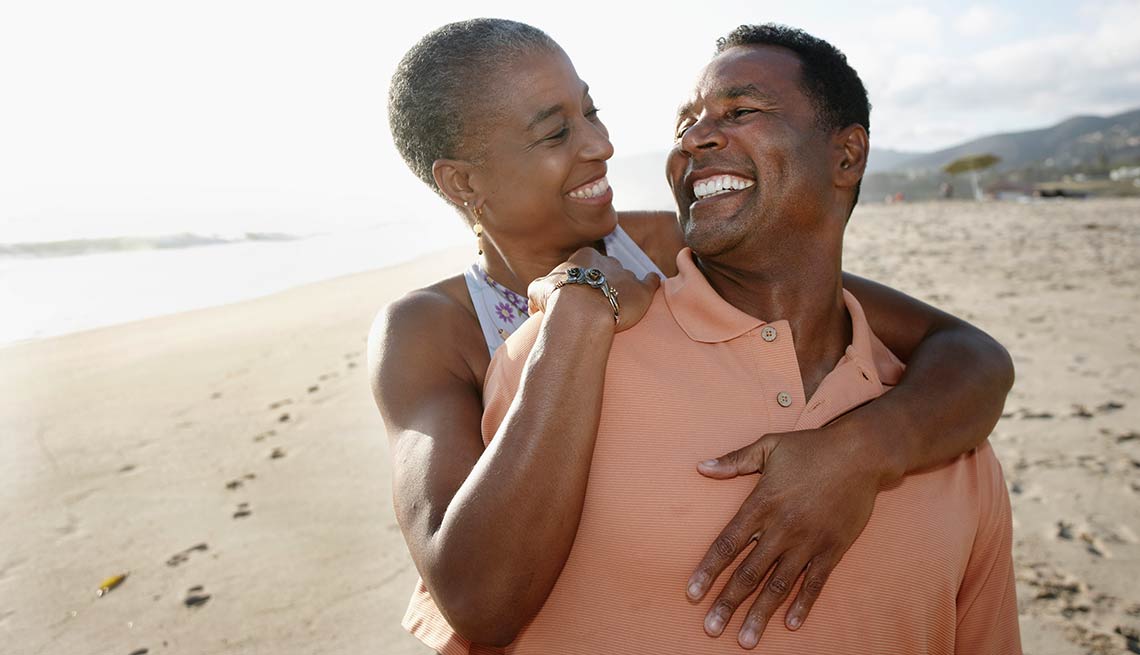 African American couple on beach, AARP Services, Inc.  ASI