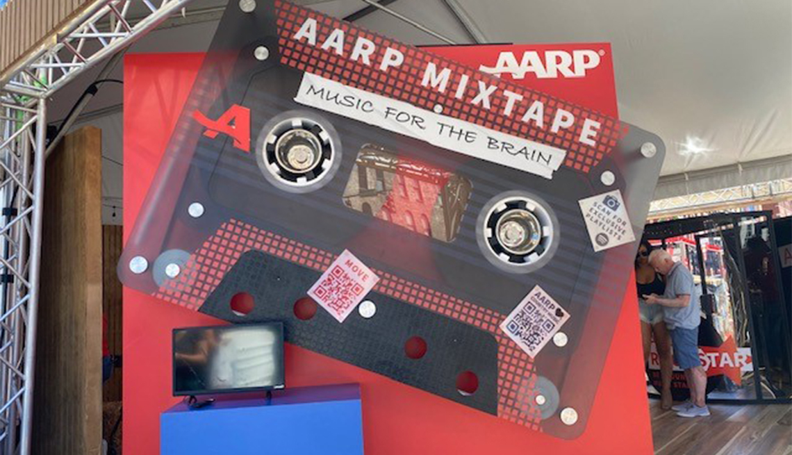 an a a r p event booth depicting an oversized music cassette tape that says mixtape