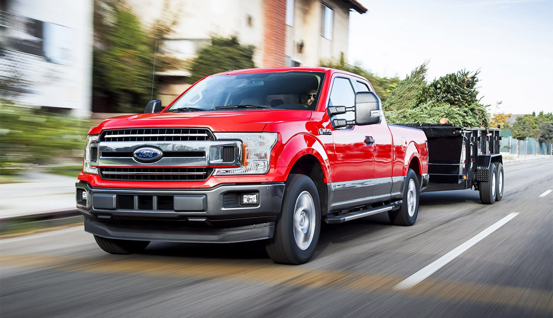 item 10 of Gallery image - Ford F-150 DIESEL - red truck on highway