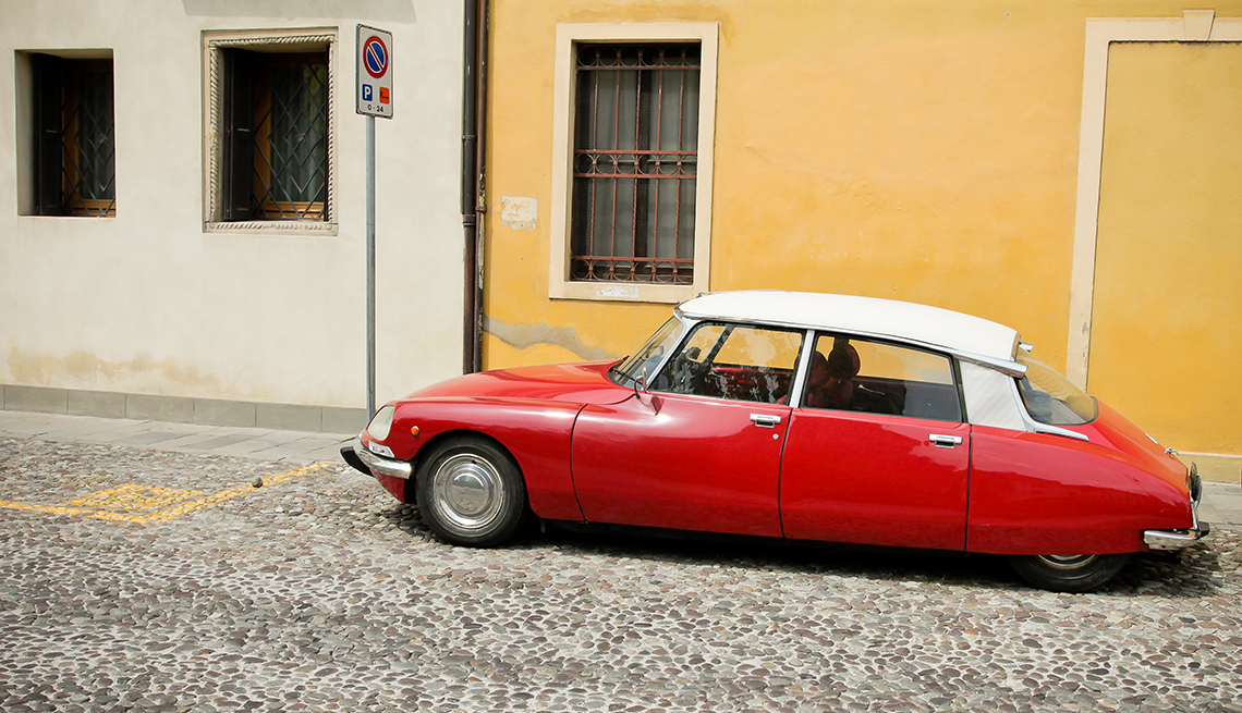 item 3 of Gallery image - A red Citro DS parked on the street