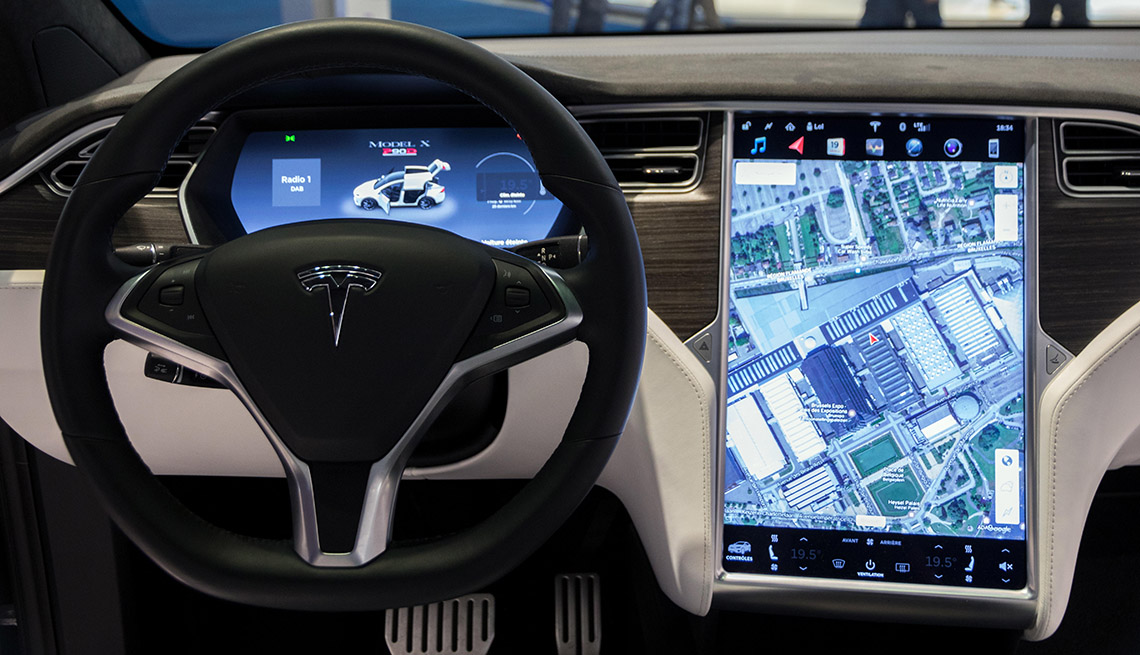 Interior dashboard with navigation of Tesla vehicle