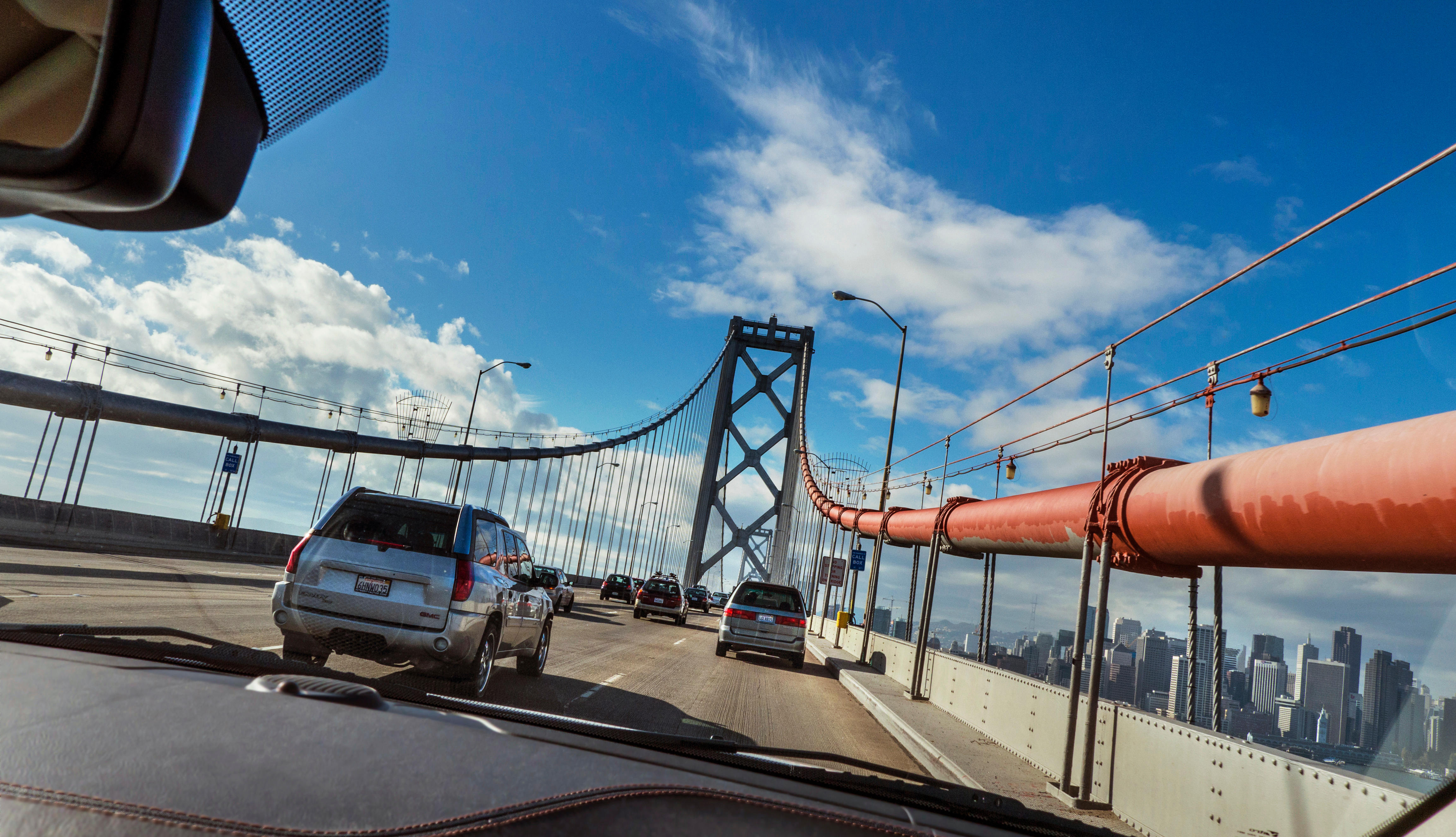 car driving over the San Francisco Bay Bridge