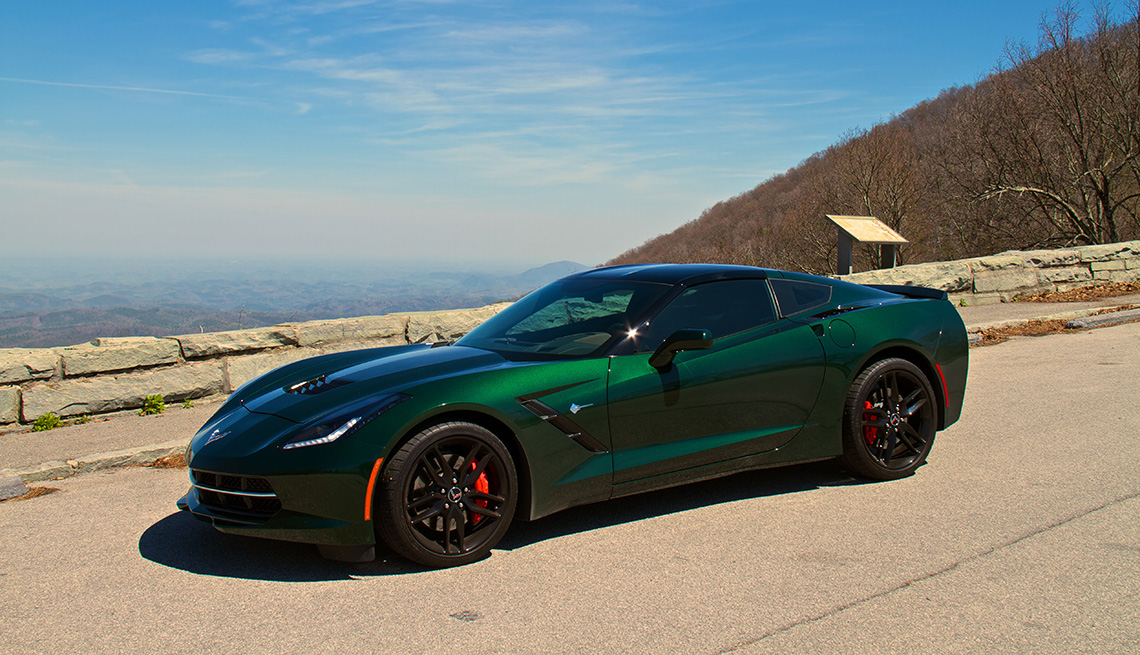 item 7 of Gallery image - A green 2014 Corvette Stingray sports car