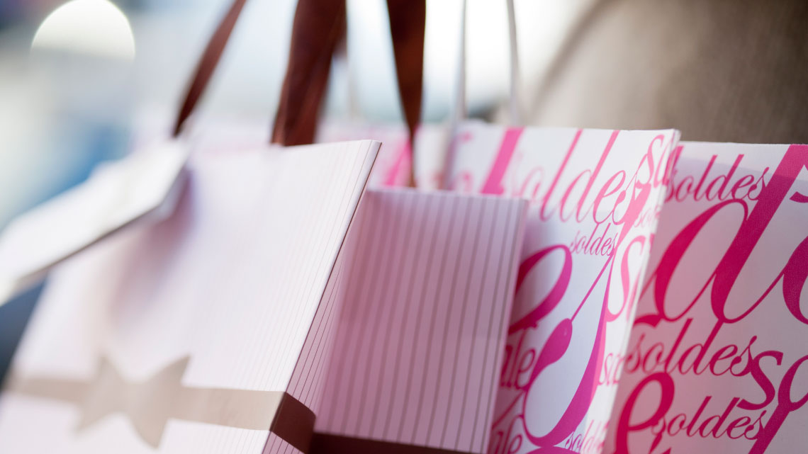 multiple pink shopping bags