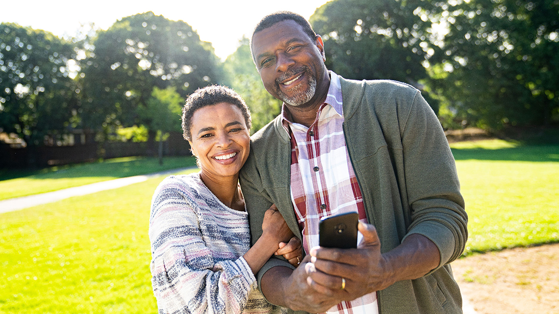 Smiling African American couple outside