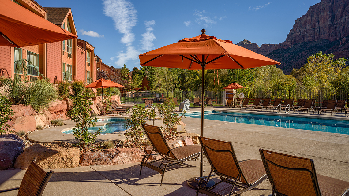 hotel resort pool outdoor pool patio area with a pretty mountain view
