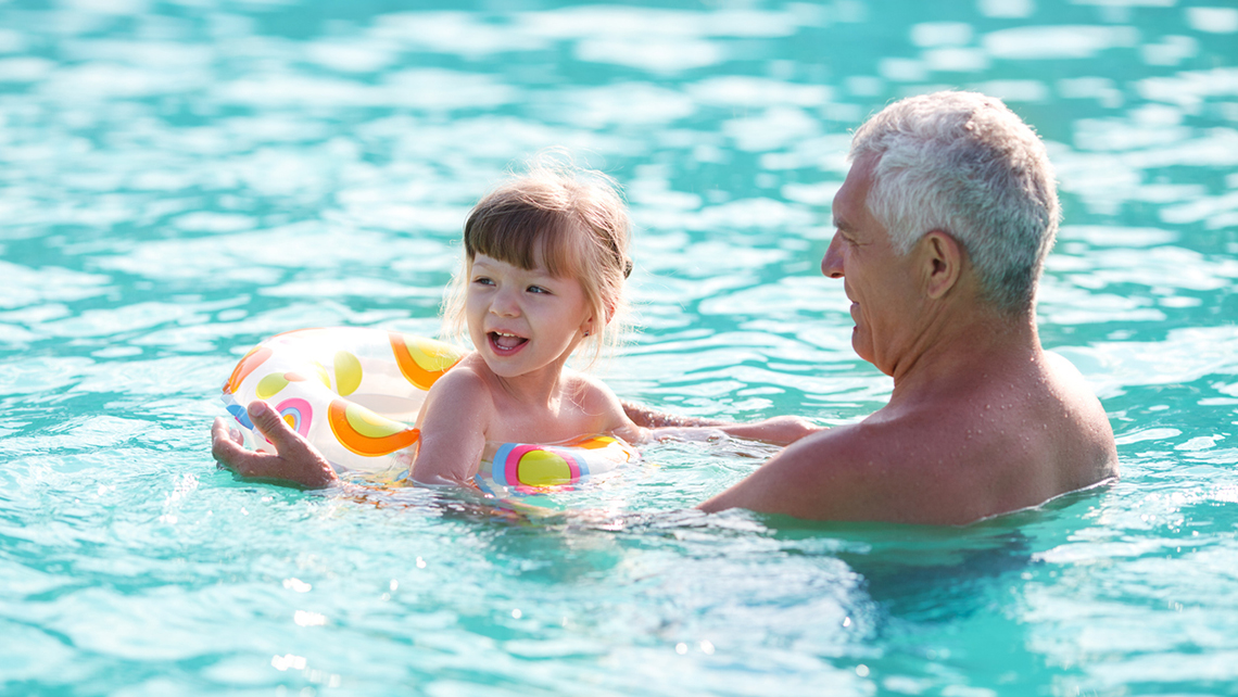 Nickelodeon Grandfather & Granddaughter Playing In Pool