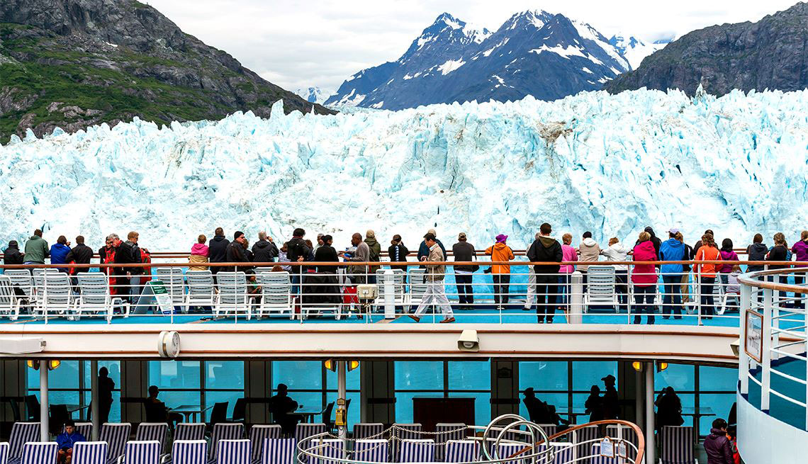 Crowd looking at Alaskan landscape on cruise 