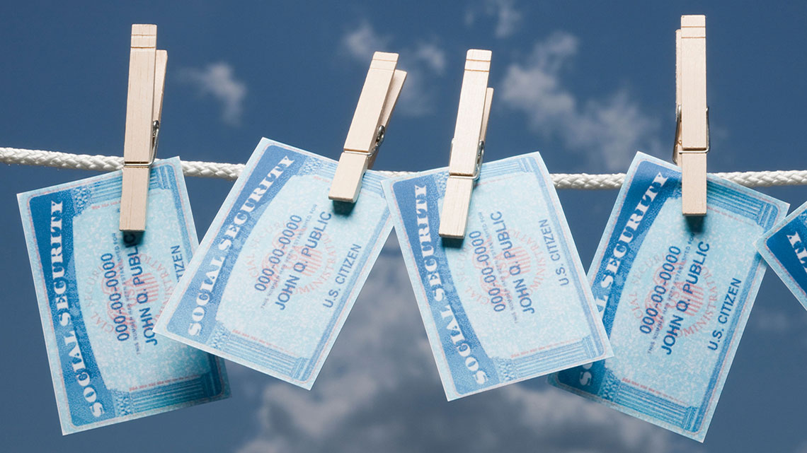 social-security-cards-pinned-to-clothes-line-outside
