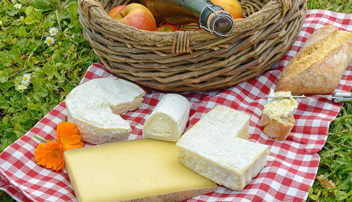 item 9 of Gallery image - A picnic basket with cheese and fruit