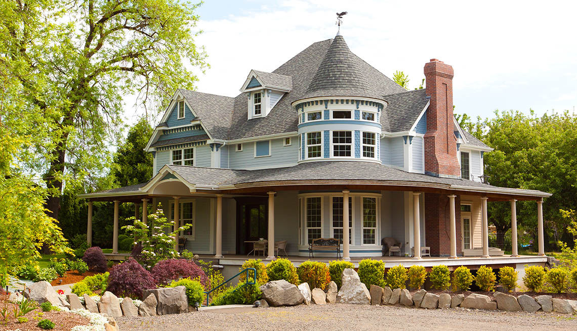 A beautiful home in Oregon has a well manicured landscaped yard and great architecture.