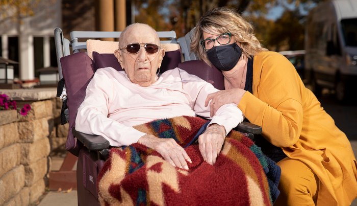 Buffy Neuberger with nursing home resident Don Redlin