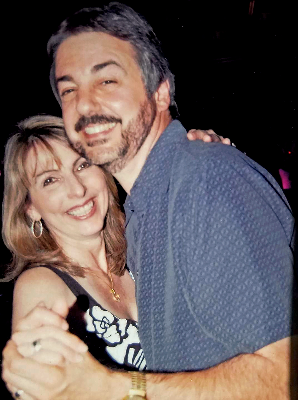 a photo of laura crews dancing with her husband don