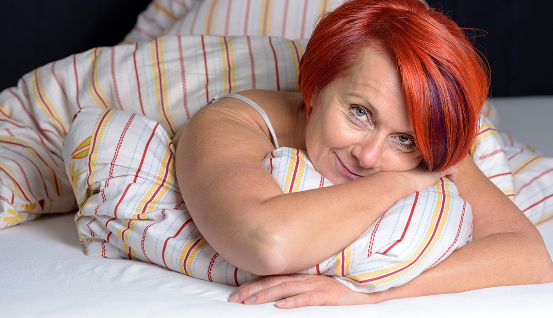Red head woman in bed