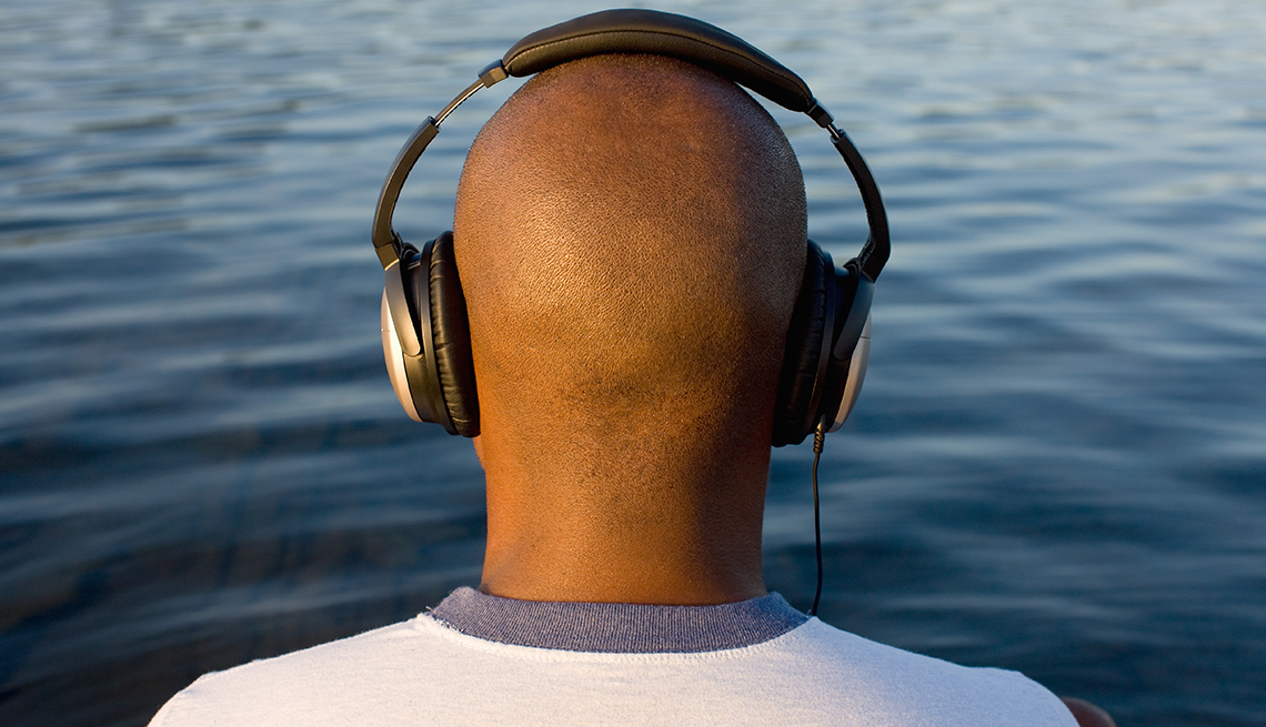 Man listening to music on headphones 