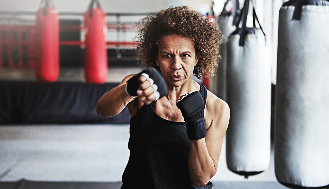 mature woman in a boxing gym 