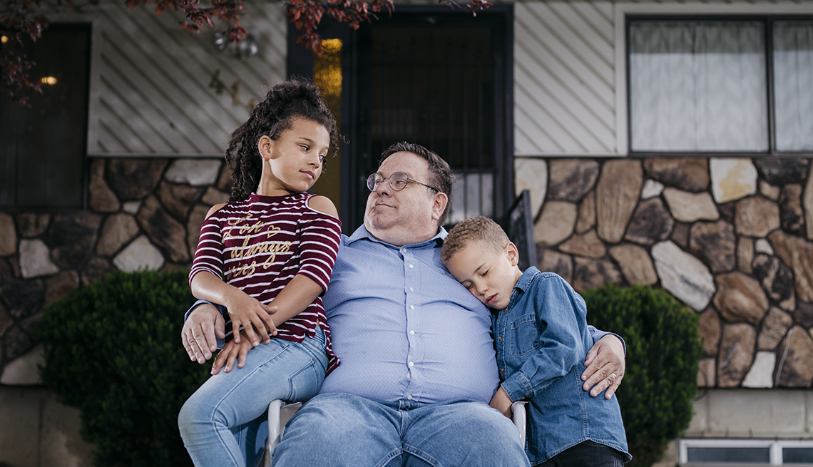 item 1 of Gallery image - Grandfather and grandchildren embrace, opioid crissis
