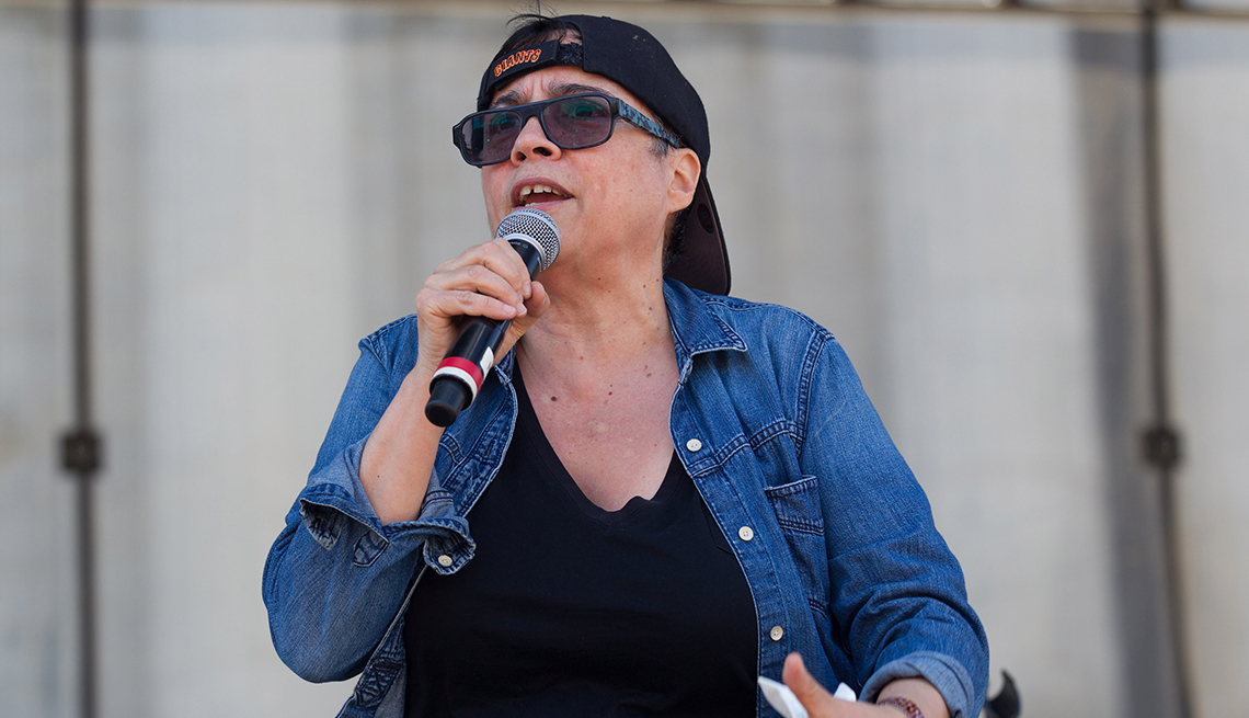 Comedian Marga Gomez performs at the Peace, Love and Understanding gathering 