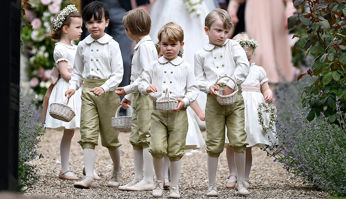 item 8 of Gallery image - Britain's Prince George, center,  at the wedding of his aunt, Pippa Middleton to James Matthews