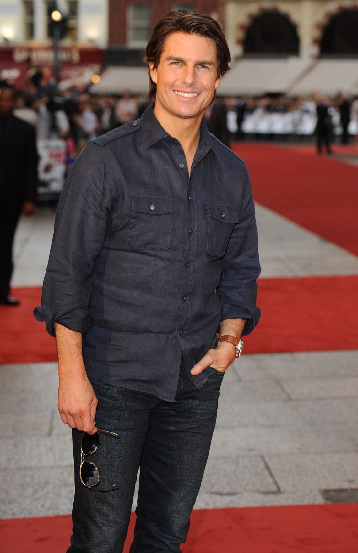 item 4 of Gallery image - Tom Cruise wearing a button down shirt and jeans