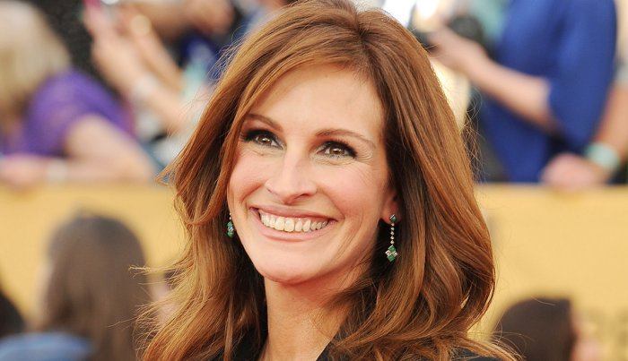 actress julia roberts smiling on the red carpet