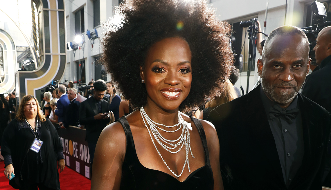 actress viola davis and actor julius tennon on the red carpet