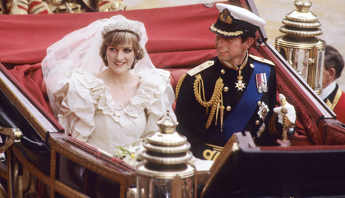 Diana, Princess of Wales and Prince Charles ride in a carriage after their wedding at St. Paul's Cathedral July 29, 1981 in London, England. 