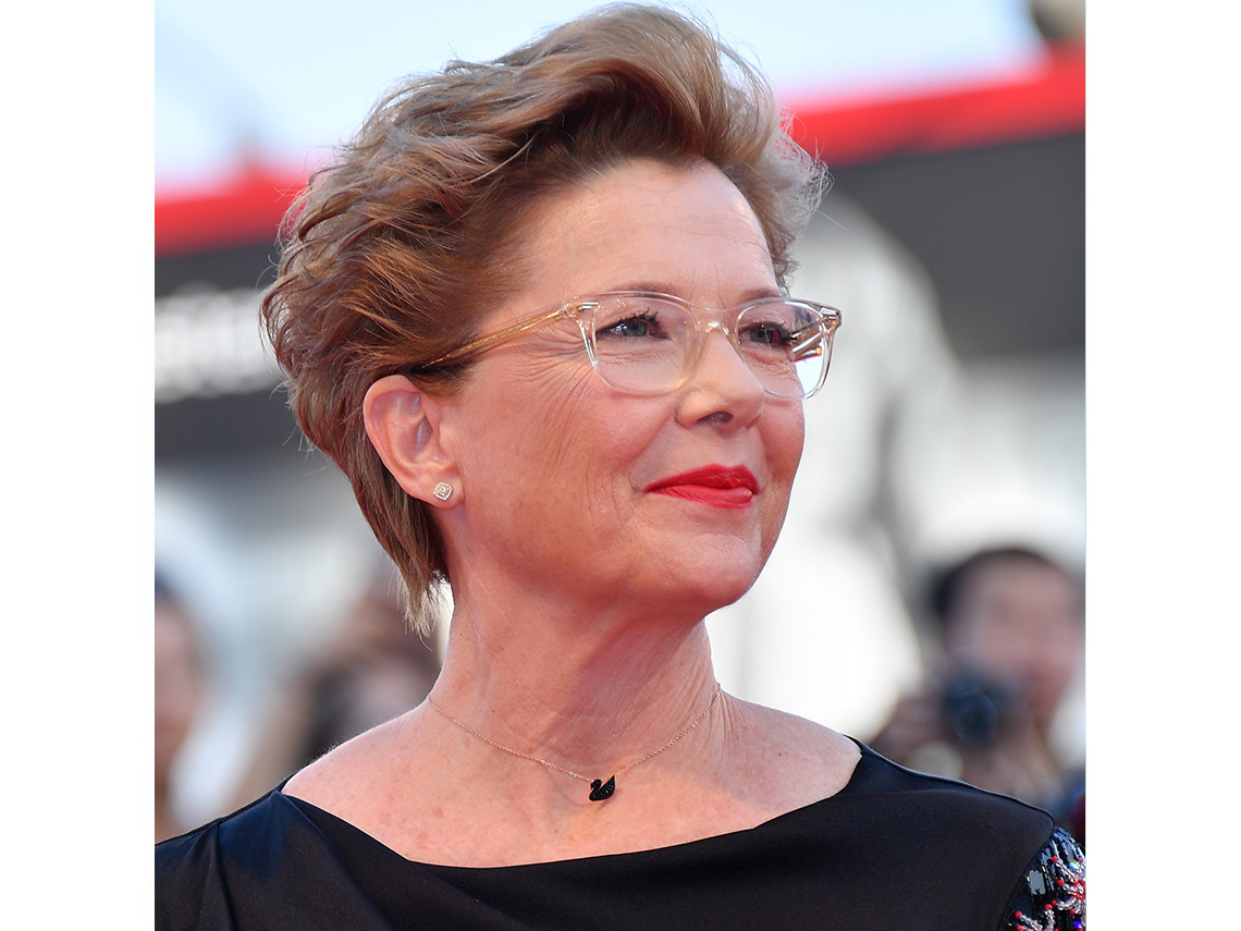 Actress Annette Bening wearing glasses with a light, clear frame