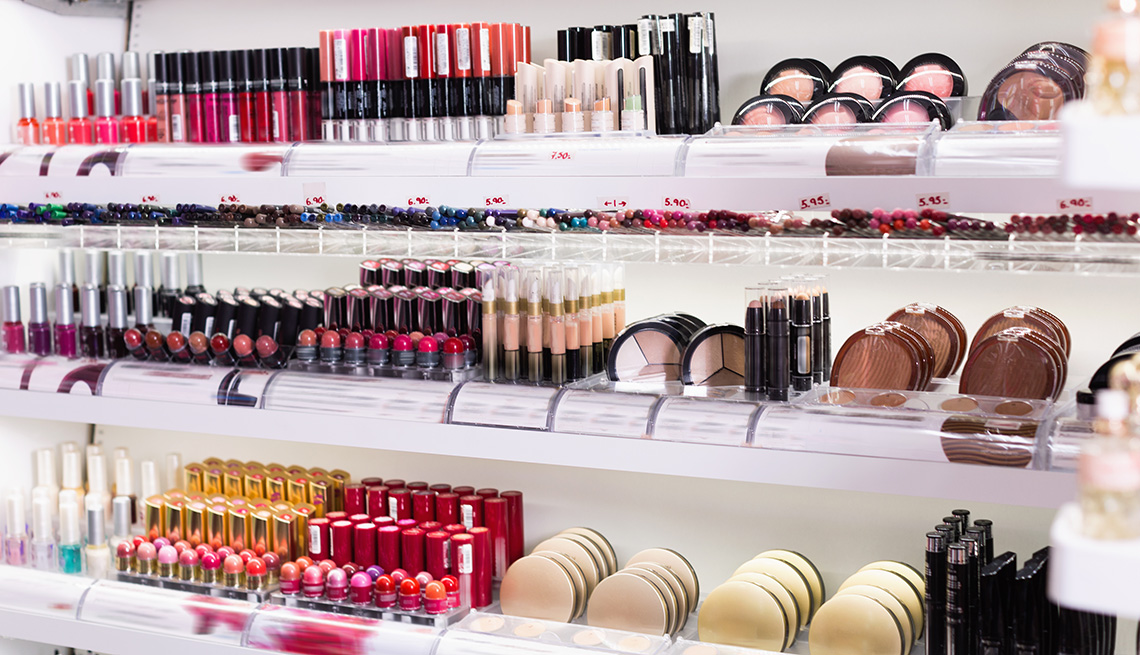 An assortment of makeup products on display in a cosmetics store