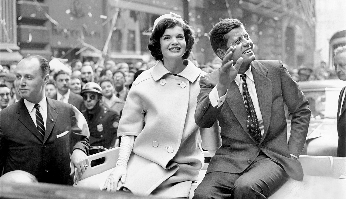 Democratic presidential nominee John F. Kennedy and his wife, Jacqueline, ride up Broadway in a ticker-tape parade