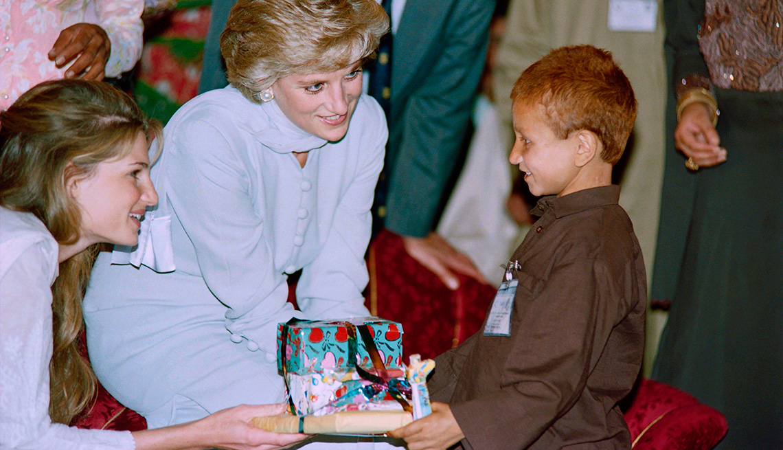 item 6 of Gallery image - Lady Diana offers a gift to cancer effected child after the variety show presented by the children at Khanum memorial cancer hospital 