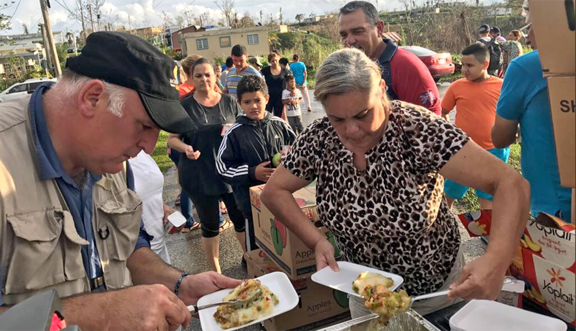 Chef Jose Andres serves food in a mountaintop town outside of Utuabo, Puerto Rico
