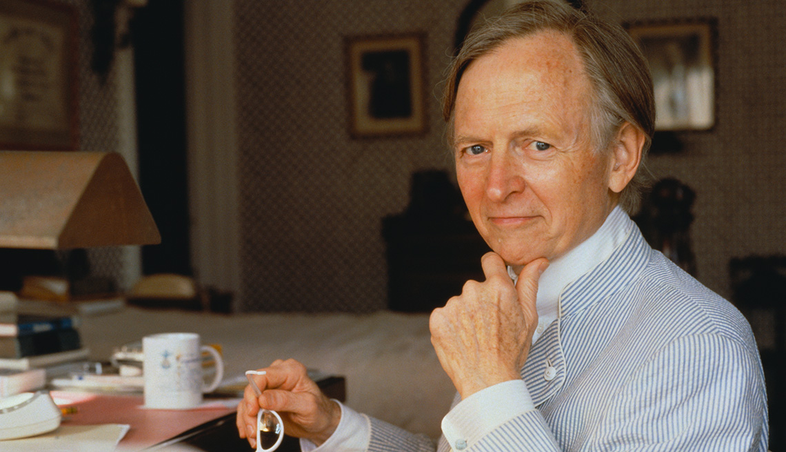 item 19 of Gallery image - Novelist Tom Wolfe seated at a desk