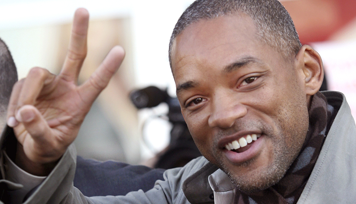 Actor Will Smith gives the peace sign 