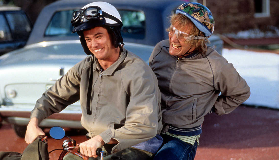 item 4 of Gallery image - Jim Carrey and Jeff Daniels riding bike in a scene from the film 'Dumb & Dumber', 1994. 
