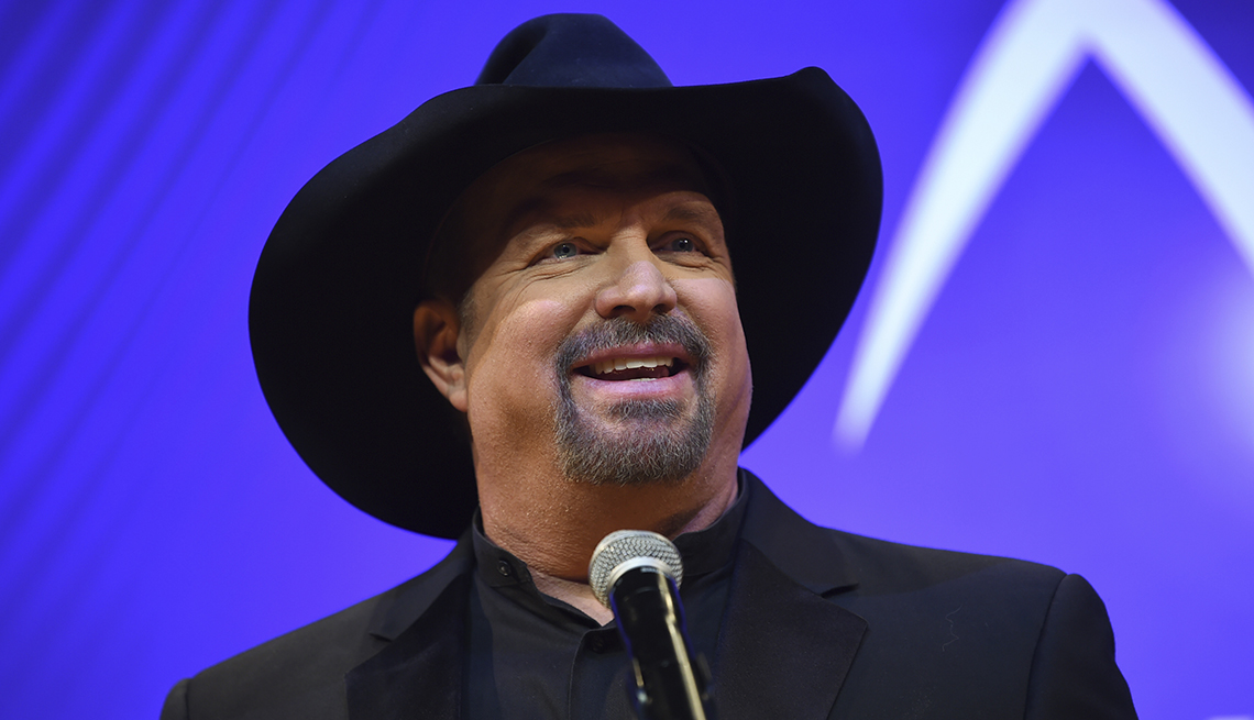 Singer/songwriter Garth Brooks takes questions in the press room at the 52nd annual CMA Awards at Bridgestone Arena on Wednesday, Nov. 14, 2018, in Nashville, Tenn.